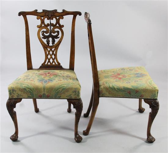 A pair of George III Chippendale style walnut dining chairs,